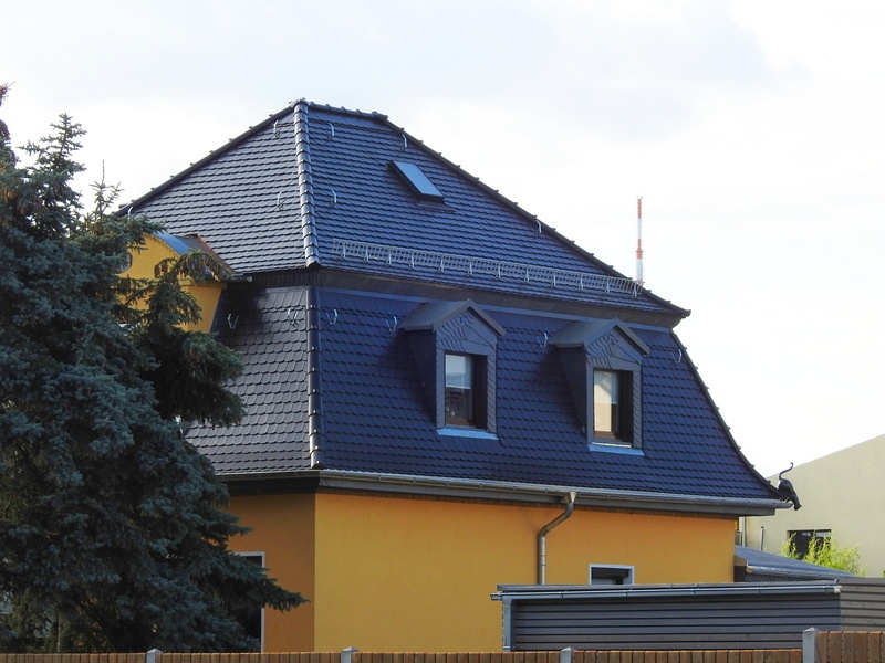 Dachdeckung mit Biberschwanz
